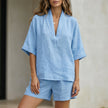 Sky blue women's summer two-piece co-ord set by FJØRNA featuring a flowy V-neck top and matching shorts.