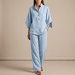 Sky blue FJØRNA two-piece women's co-ord set with button-front top and matching pants, stylish and elegant for casual wear.