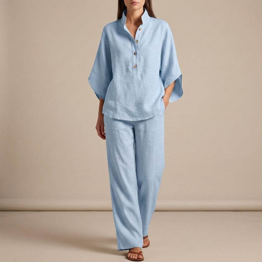 Sky blue FJØRNA two-piece women's co-ord set with button-front top and matching pants, stylish and elegant for casual wear.