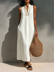 FJØRNA sleeveless maxi dress for women with flowing fabric and sleeveless design, perfect for summer or casual wear.