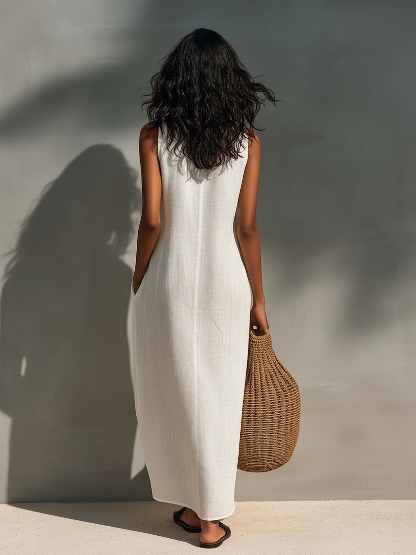 FJØRNA sleeveless maxi dress for women, flowing fabric, V-neckline, and ankle-length design, perfect for summer and casual wear.