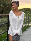 Soft Girl ruffled mini dress by FJØRNA featuring a feminine design, perfect for party or day wear, shown on a model.