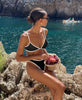 FJØRNA women's feminine cut bikini set in stylish swimwear with a modern design, shown on a model.