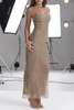 White FJØRNA sparkle sequined fit maxi dress, showcasing elegant design with shimmering sequins and fitted silhouette.