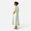 Women's breathable striped midi dress by FJØRNA, lightweight summer fit, flowing design ideal for warm weather.