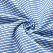 FJØRNA women's striped midi dress with button details and side pockets, stylish and comfortable for everyday wear.