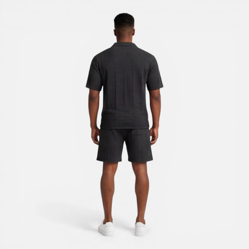 Men's structured knit polo shorts set by FJØRNA, breathable summer two-piece outfit for men, featuring a classic polo and matching shorts.