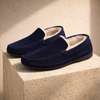 Men's suede wool-lined slippers by FJØRNA, cozy winter shoes with soft wool interior and durable suede exterior.