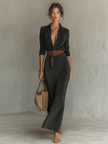FJØRNA women's suede maxi dress featuring a flowing silhouette, long sleeves, and elegant design in soft suede fabric.