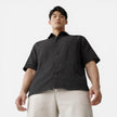 Men's lightweight Tencel short sleeve shirt by FJØRNA, designed for summer comfort, in a relaxed fit with natural fabric texture.
