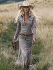 FJØRNA tassel midi casual dress with flowing fabric and tassel details, displayed laid flat on a neutral background.