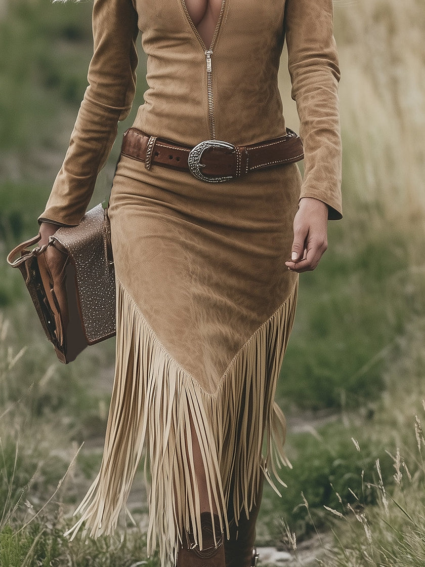 FJØRNA tassel midi dress featuring a casual design with flowing fabric and decorative tassels, perfect for relaxed occasions.