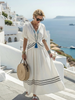 FJØRNA women's summer midi dress with short sleeves, wrap style, flowy relaxed fit, v-neck design, ideal for warm weather.