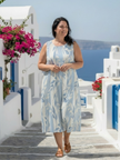 FJØRNA women's sleeveless summer midi dress with blue leaf print, perfect for warm weather and casual occasions.