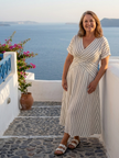 FJØRNA women's summer midi dress with V-neck, short sleeves, flowy fabric, perfect for warm weather and casual occasions.
