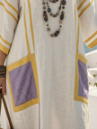 FJØRNA summer maxi dress for women with short sleeves, pockets, and a flowy design, perfect for warm weather.