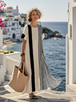 FJØRNA summer maxi dress for women with striped pattern, short sleeves, wrap style, lightweight fabric, perfect for warm weather.