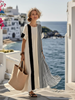 FJØRNA summer maxi dress for women with striped pattern, short sleeves, wrap style, lightweight fabric, perfect for warm weather.