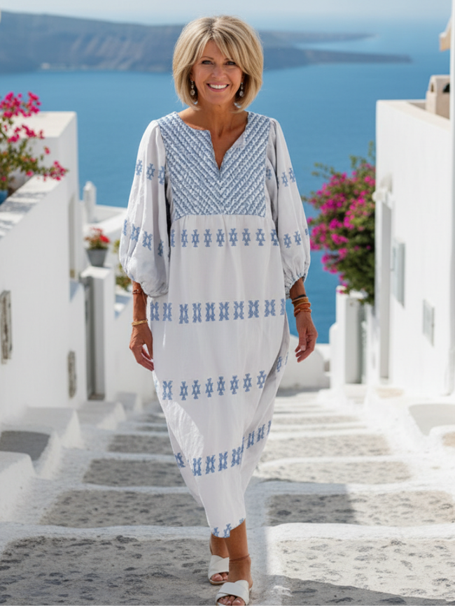 FJØRNA summer maxi dress for women with long sleeves, flowy fabric, and a relaxed fit, perfect for warm weather.