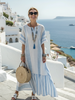 FJØRNA summer maxi dress for women with short sleeves and bold striped pattern, perfect for warm weather and casual occasions.