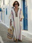 Flowy summer maxi dress for women with pockets by FJØRNA, featuring a lightweight, breezy design perfect for warm weather.