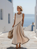 FJØRNA women's sleeveless wrap cotton summer maxi dress in light, flowy fabric, perfect for warm weather and casual occasions.
