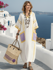 FJØRNA summer maxi dress for women with short sleeves, pockets, and a flowy design, ideal for warm weather and casual outings.