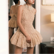FJØRNA women's tulle back bow dress in mini, midi, or maxi length, featuring delicate tulle fabric and elegant bow detail.