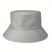 Unisex FJØRNA minimalist bucket hat with stitched brim, lightweight and versatile summer accessory for casual wear.