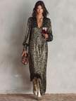 FJØRNA V-neck maxi dress in elegant fabric, featuring a flowing silhouette and stylish neckline, perfect for cocktail occasions.