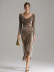 FJØRNA velvet midi evening dress with a fitted bodice and flowing skirt, showcased on a model with elegant styling.