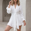 White summer two-piece set for women by FJØRNA featuring ruffle details and a relaxed fit, perfect for casual wear.