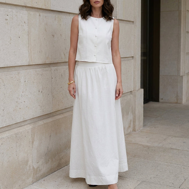 White FJØRNA two-piece women's co-ord set with a slit design, stylish and elegant for casual or semi-formal wear.