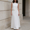 White FJØRNA two-piece women's co-ord set with a slit design, stylish and elegant for casual or semi-formal wear.