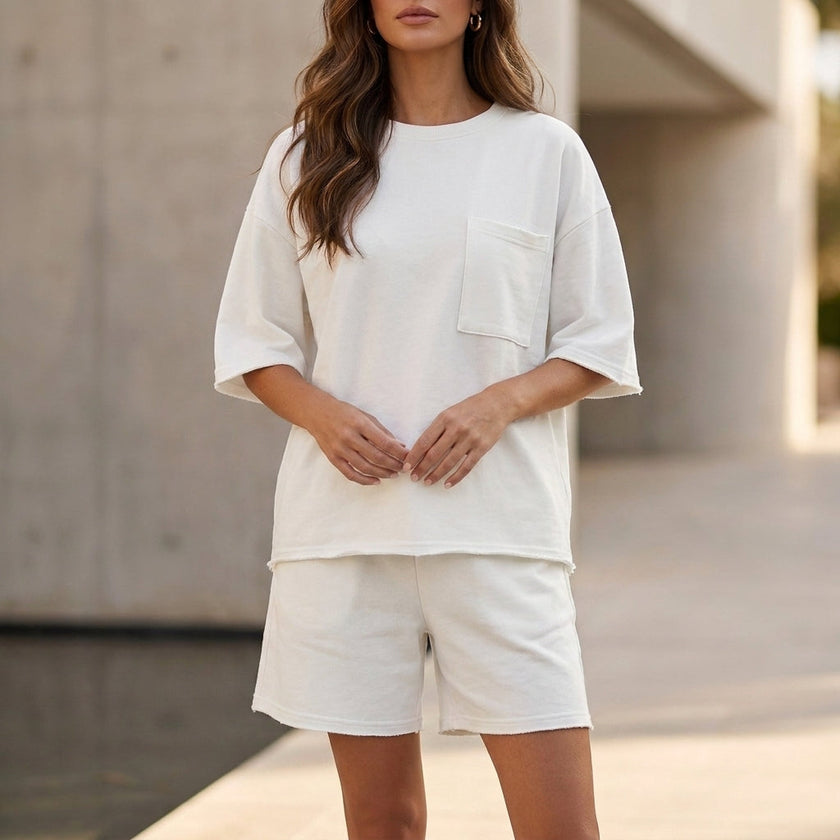 White FJØRNA women's summer two-piece set with pockets, lightweight co-ord matching outfit, casual and comfortable for warm weather.