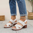 White FJØRNA orthopedic criss-cross slingback platform sandals for women with block heels and open toes.