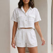 White summer two-piece women's co-ord set with button front top and matching shorts from FJØRNA.