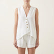Elegant white two-piece women's co-ord set with button front V-neck top, stylish and comfortable from FJØRNA.