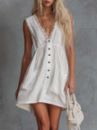 White lace V-neck mini dress by FJØRNA, casual style with delicate lace details and a flattering V-neckline.