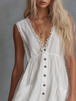White lace V-neck mini dress by FJØRNA featuring a casual style with delicate lace details and a V-neckline.