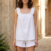 White women's summer two-piece ruffle co-ord set from FJØRNA, featuring a stylish matching top and skirt ensemble.