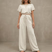 White FJØRNA women's summer two-piece co-ord set with drawstring detail, lightweight and matching for casual wear.