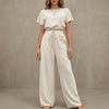 White FJØRNA women's summer two-piece co-ord set with drawstring detail, lightweight and matching for casual wear.