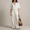 White FJØRNA two-piece women's co-ord set with drawstring detail, stylish and comfortable for casual or trendy outfits.
