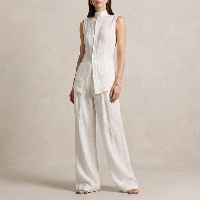 White FJØRNA women's two-piece co-ord set with an asymmetric high neck, featuring a stylish and elegant design.
