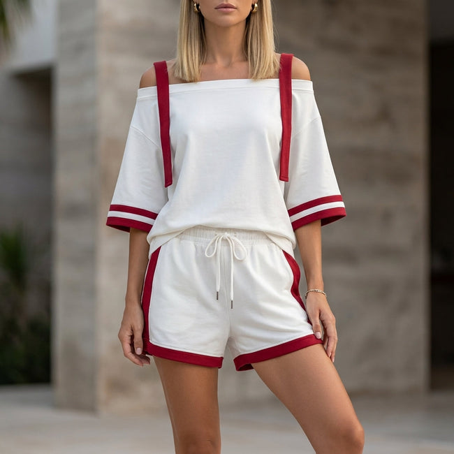 White FJØRNA women's summer two-piece drawstring off-shoulder co-ord set with crop top and high-waisted shorts.