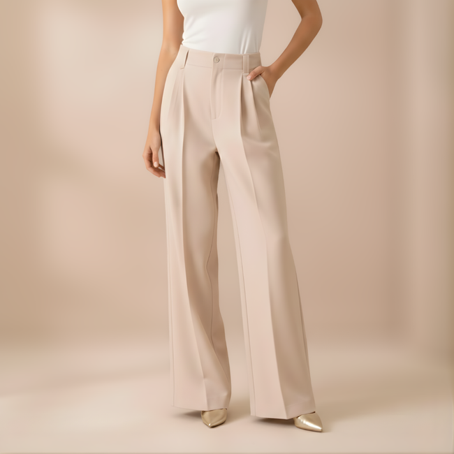 FJØRNA women's high-waist wide-leg trousers, loose pull-on pants with a relaxed fit, shown on a model.
