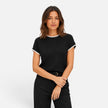 Women’s contrast trim knit top with short sleeves and crew neck by FJØRNA, styled with a casual, fitted look.