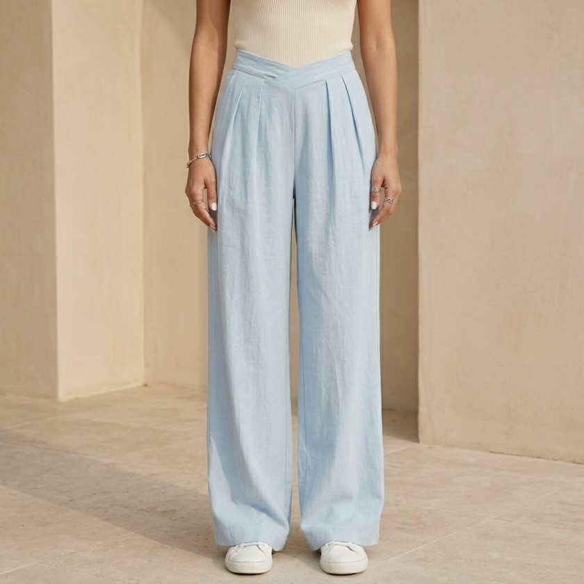Women’s loose pull-on wide-leg trousers with criss-cross waist by FJØRNA, stylish and comfortable casual pants for women.