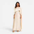 Women wearing FJØRNA women's draped sleeve maxi dress featuring flowing fabric and elegant design, full-length view.